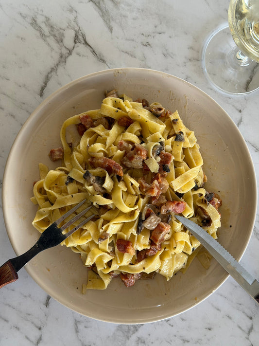 Creamy White Wine Guanciale, Mushroom & Onion Pasta